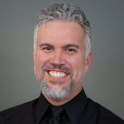 professional headshot of Derek Niño